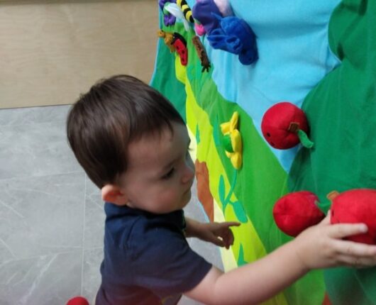 kid playing at our early learning center